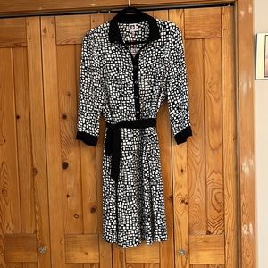 New with tags—beautiful belted black and white dress.  Side zipper.